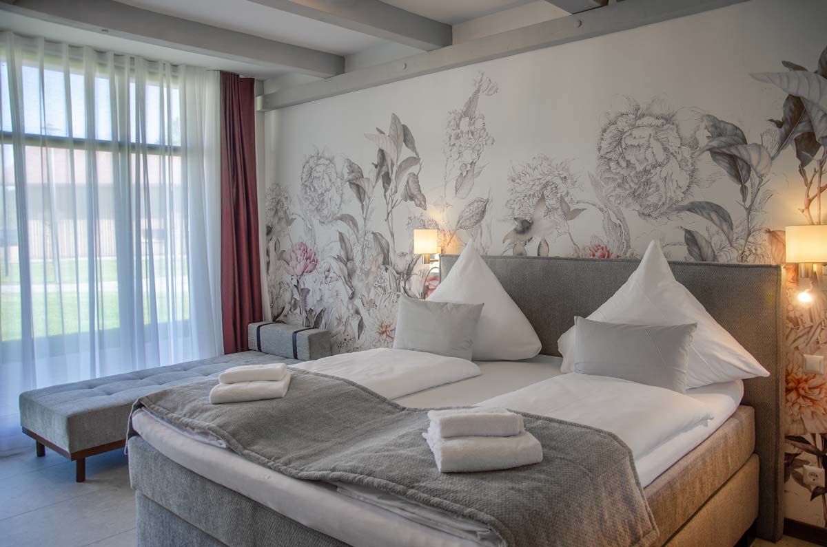 Das Bett im Komfort Zimmer Residence des Parkhotel Remisenhof.